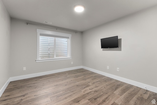 2388 E Horizon Dr Unit 907, Eagle Mountain, UT 84005 - unfurnished room featuring wood finished floors and baseboards