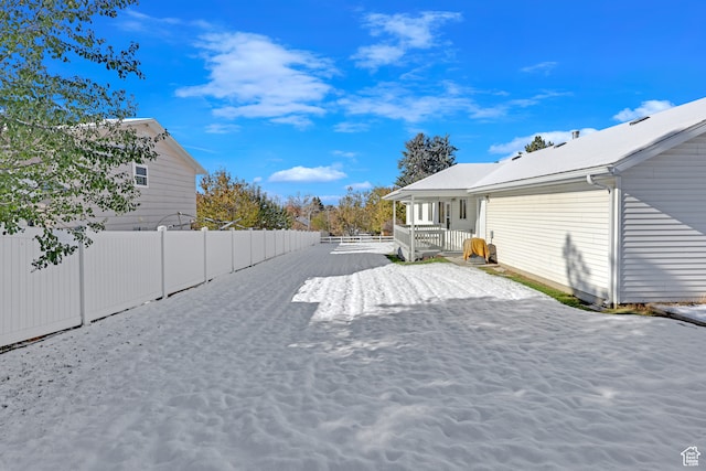 view of yard featuring covered porch