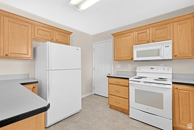 kitchen featuring white appliances
