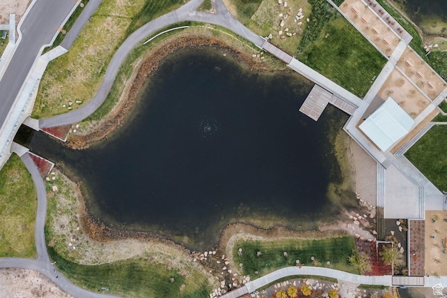 birds eye view of property featuring a water view