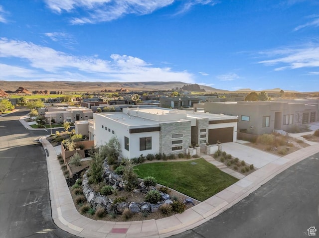 5349 W 3160 S, Hurricane, UT 84737 - view of front of property featuring a mountain view, a garage, and a front lawn