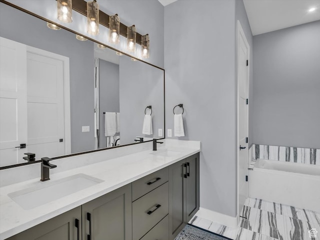 5349 W 3160 S, Hurricane, UT 84737 - bathroom featuring vanity and a tub to relax in