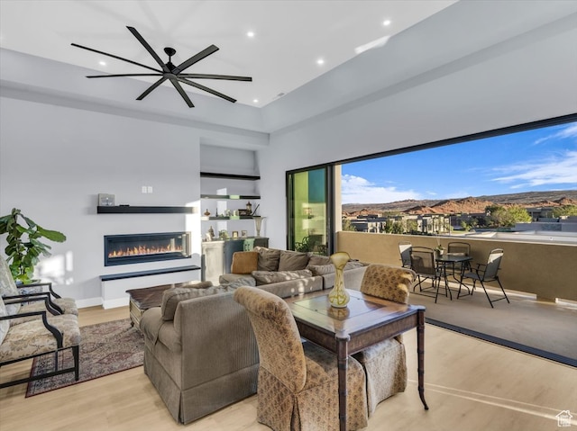 5349 W 3160 S, Hurricane, UT 84737 - living room with light hardwood / wood-style flooring and ceiling fan