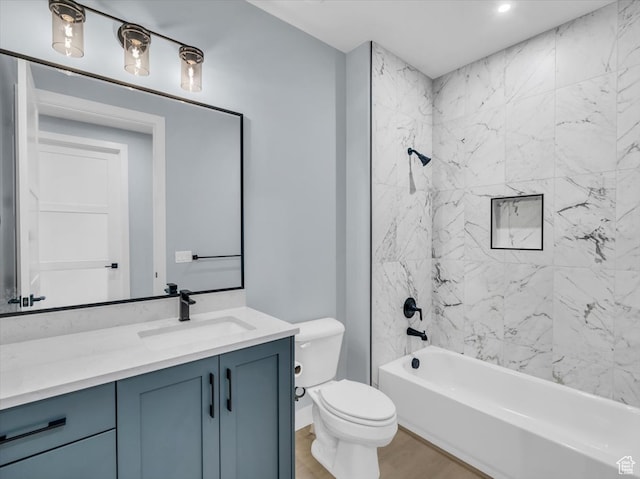 5349 W 3160 S, Hurricane, UT 84737 - full bathroom with vanity, tiled shower / bath combo, hardwood / wood-style flooring, and toilet