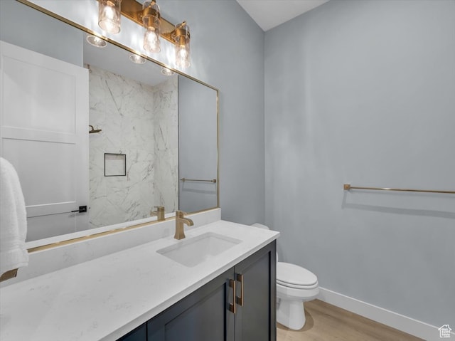 5349 W 3160 S, Hurricane, UT 84737 - bathroom with vanity, wood-type flooring, and toilet
