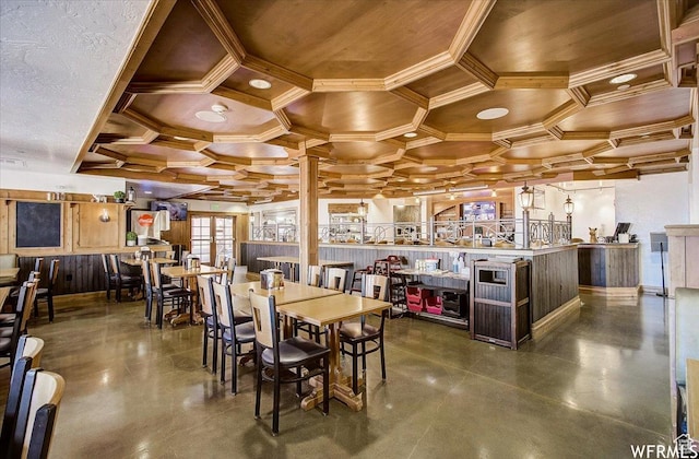 784 W Resort Dr Unit 206, Midway, UT 84049 - dining space featuring coffered ceiling, crown molding, concrete floors, and wood ceiling