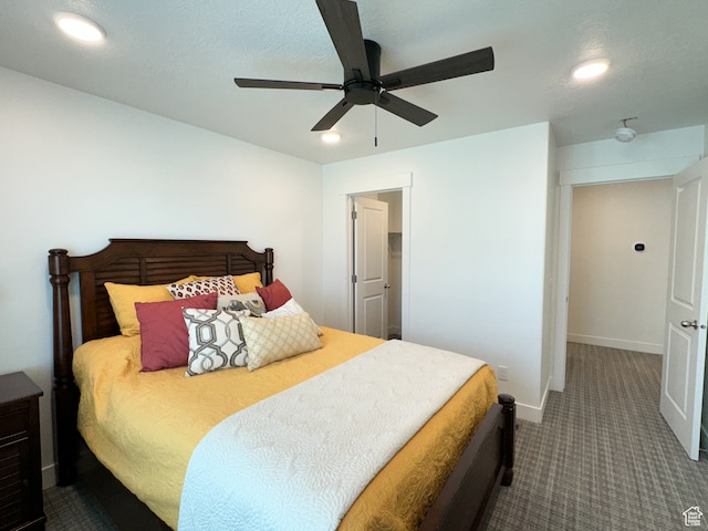 carpeted bedroom with ceiling fan