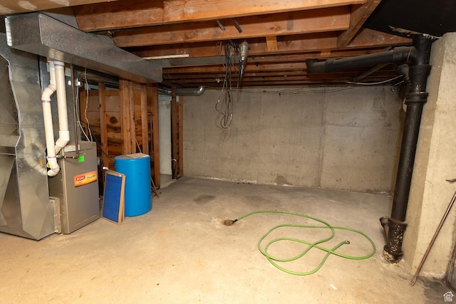 215 N 300 W, Salina, UT 84654 - unfinished below grade area with heating unit and a water pressure tank