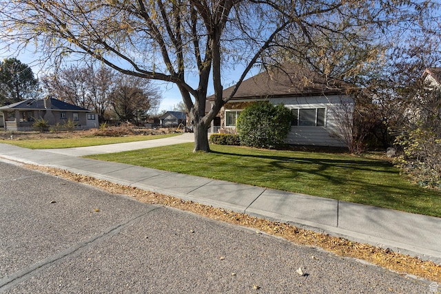 215 N 300 W, Salina, UT 84654 - obstructed view of property featuring a front yard