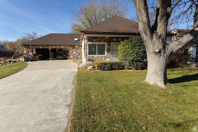 215 N 300 W, Salina, UT 84654 - view of front of home with concrete driveway, a porch, a front lawn, and stone siding