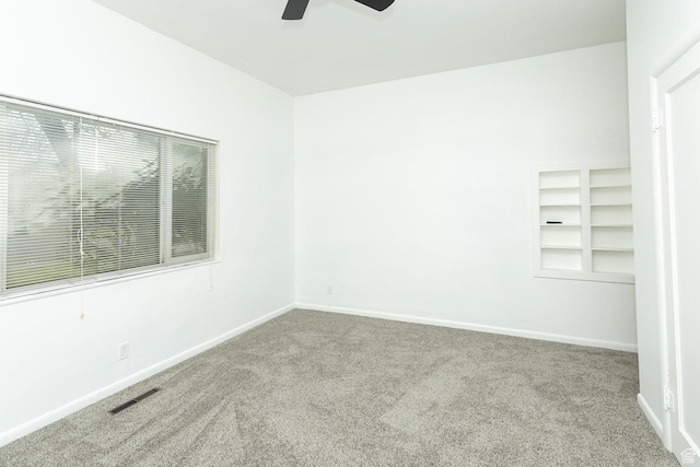 215 N 300 W, Salina, UT 84654 - unfurnished room featuring carpet floors, ceiling fan, and built in features