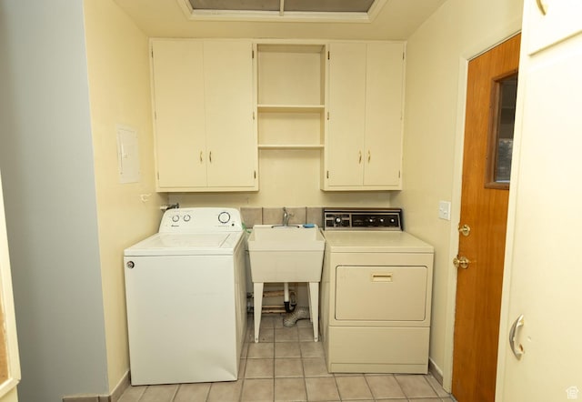 215 N 300 W, Salina, UT 84654 - washroom with cabinet space, light tile patterned floors, and separate washer and dryer