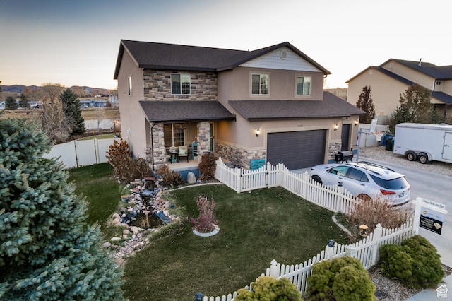 1605 W 1400 S, Vernal, UT 84078 - view of front facade with a garage and a lawn