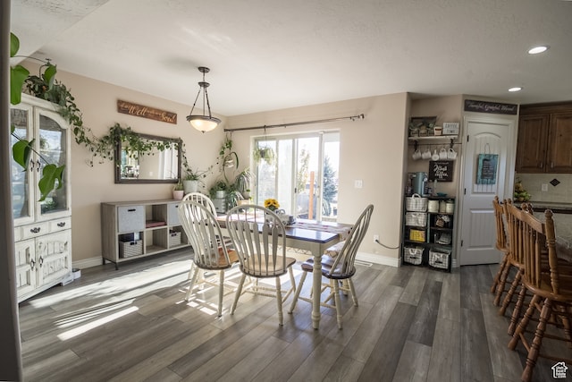 1605 W 1400 S, Vernal, UT 84078 - dining area featuring dark hardwood / wood-style flooring and a textured ceiling