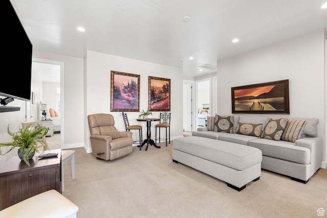 living room featuring light carpet