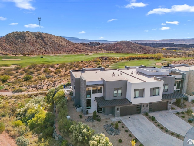 drone / aerial view featuring a mountain view