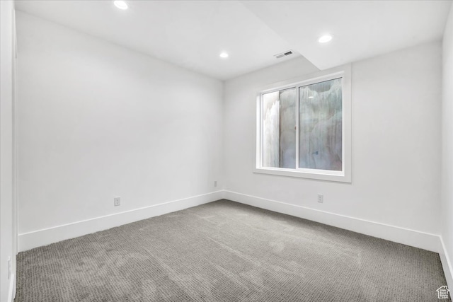 spare room with carpet floors