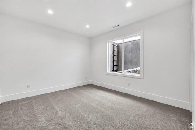 spare room with carpet