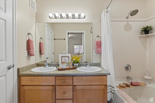 5012 S Timber Way E Unit 205, Holladay, UT 84117 - bathroom featuring shower / tub combo with curtain and vanity