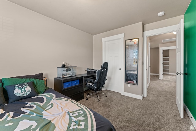 bedroom featuring light carpet