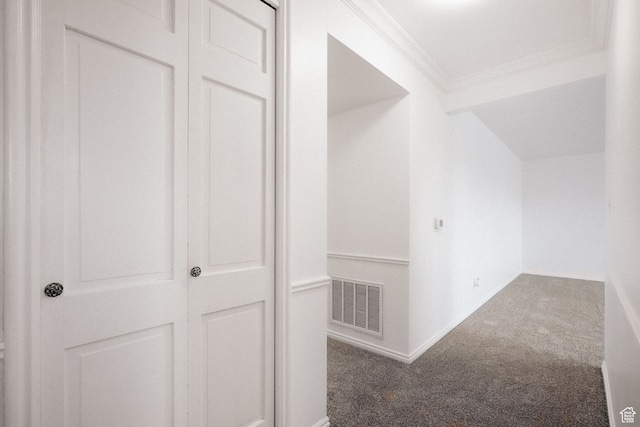hall featuring carpet flooring and ornamental molding