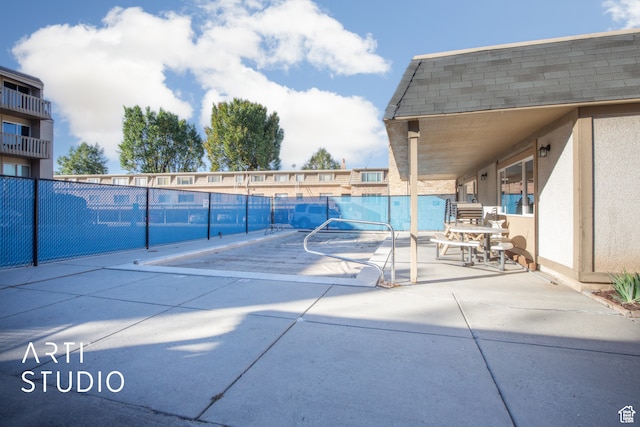 view of pool featuring a patio area