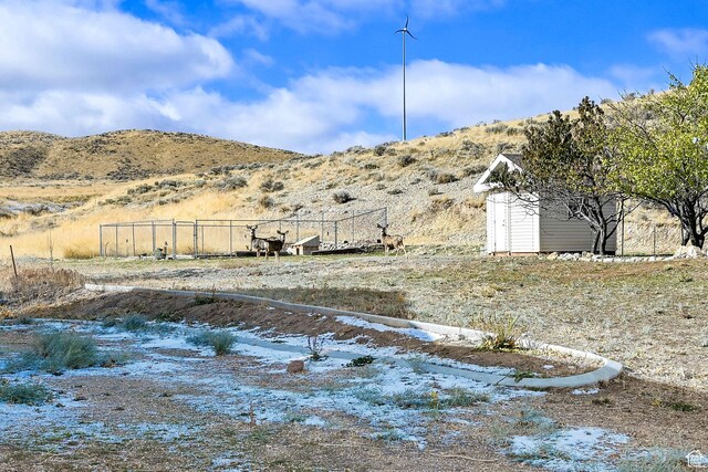 10877 N Wallace Ln E, Tremonton, UT 84337 - view of yard featuring a mountain view