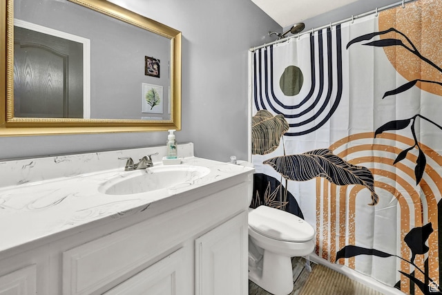 10877 N Wallace Ln E, Tremonton, UT 84337 - full bathroom featuring vanity, toilet, and a shower with shower curtain