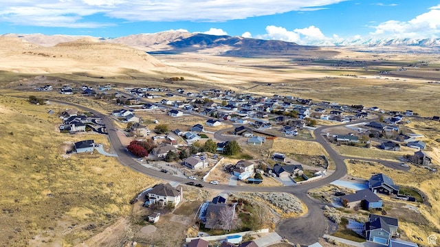 10877 N Wallace Ln E, Tremonton, UT 84337 - aerial view of property's location with a mountainous background and nearby suburban area