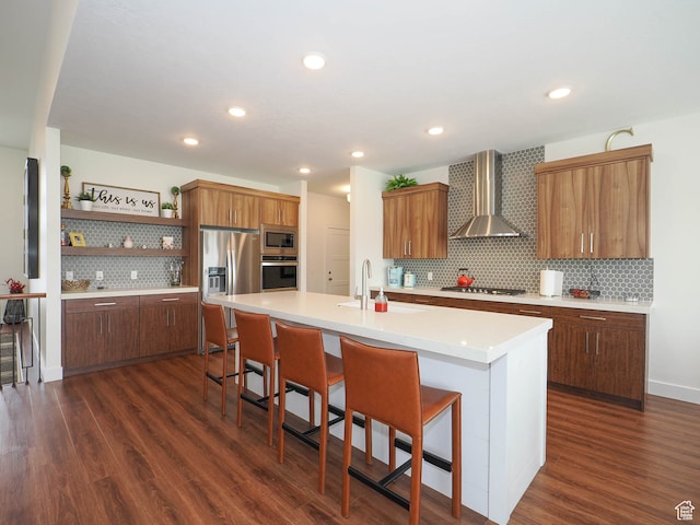 1766 S Degiorgio W, Taylor, UT 84401 - kitchen featuring sink, stainless steel appliances, wall chimney range hood, a kitchen bar, and a kitchen island with sink