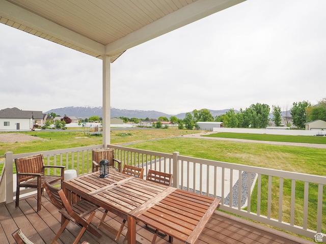 1766 S Degiorgio W, Taylor, UT 84401 - wooden deck with a mountain view and a yard