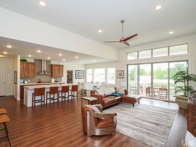 1766 S Degiorgio W, Taylor, UT 84401 - living room featuring ceiling fan and dark wood-type flooring