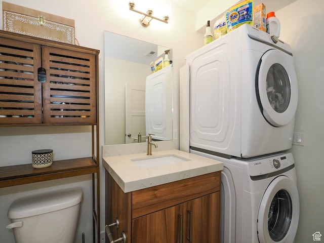 1766 S Degiorgio W, Taylor, UT 84401 - laundry area with sink and stacked washer and clothes dryer