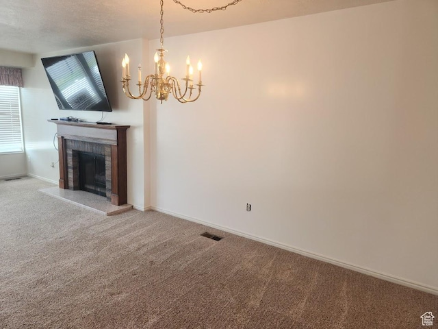 3689 W 5215 S, Taylorsville, UT 84129 - unfurnished living room with carpet, baseboards, a chandelier, visible vents, and a brick fireplace