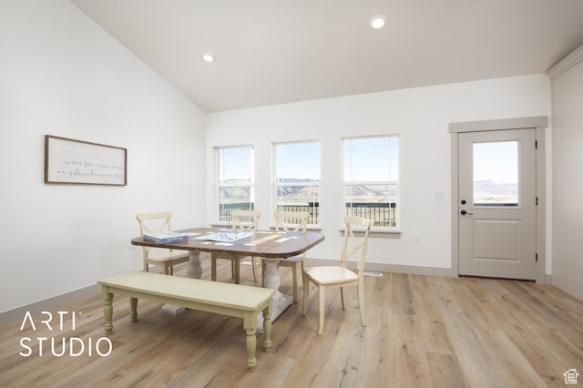 1242 S 500 W Unit 07, Manti, UT 84642 - dining room featuring a healthy amount of sunlight, vaulted ceiling, and light wood-type flooring