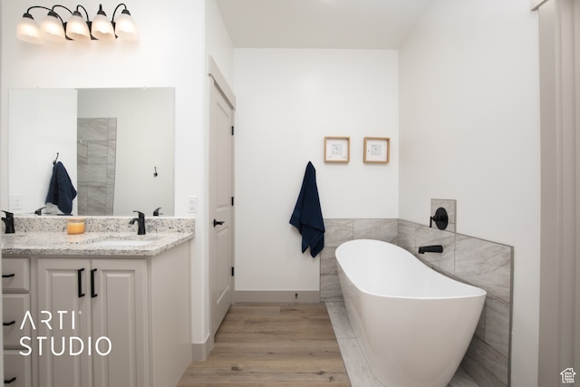 1242 S 500 W Unit 07, Manti, UT 84642 - bathroom featuring vanity, wood-type flooring, and a tub