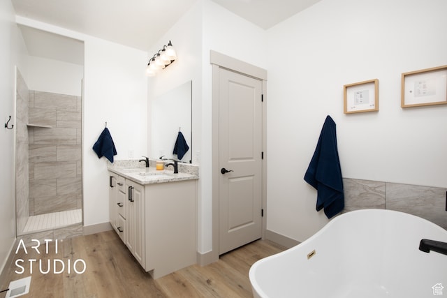 1242 S 500 W Unit 07, Manti, UT 84642 - bathroom featuring wood-type flooring, vanity, and plus walk in shower