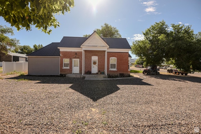 410 N Main St, Beaver, UT 84713 - neoclassical home featuring brick siding and a metal roof