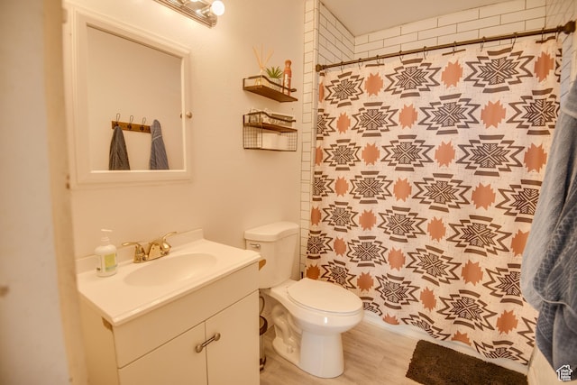 410 N Main St, Beaver, UT 84713 - bathroom with vanity, curtained shower, and wood finished floors