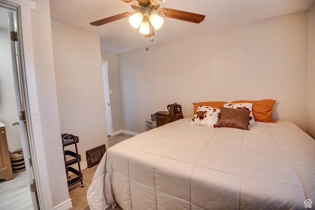 410 N Main St, Beaver, UT 84713 - carpeted bedroom featuring a ceiling fan and baseboards