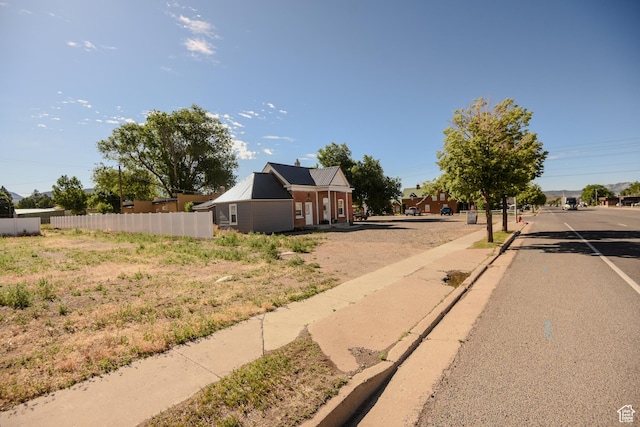 410 N Main St, Beaver, UT 84713 - view of asphalt road featuring curbs and sidewalks