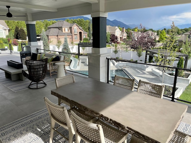 106 E 710 N, Lindon, UT 84042 - view of patio / terrace featuring ceiling fan, a residential view, a mountain view, and outdoor dining area