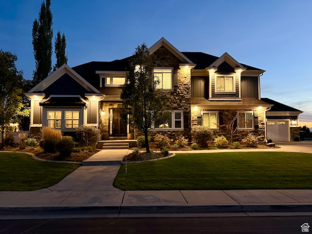 craftsman-style house with a lawn