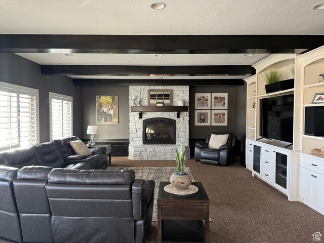 106 E 710 N, Lindon, UT 84042 - carpeted living room featuring beam ceiling, a textured ceiling, and a stone fireplace