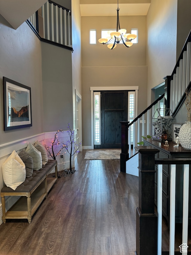 106 E 710 N, Lindon, UT 84042 - entryway featuring dark hardwood / wood-style flooring, a towering ceiling, and an inviting chandelier
