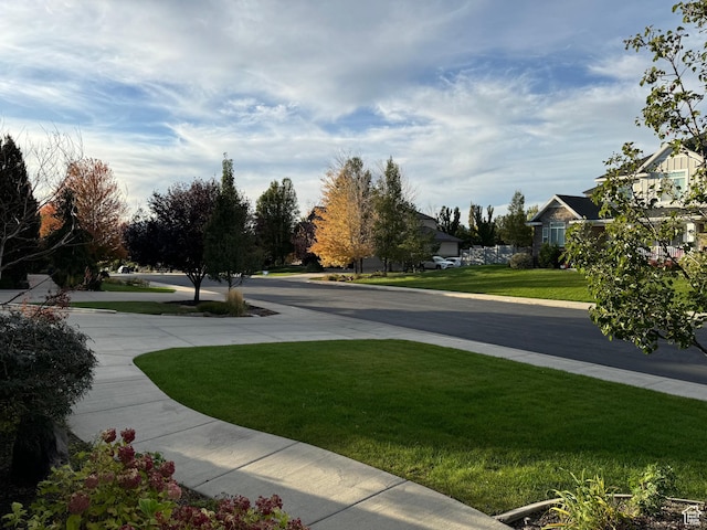 106 E 710 N, Lindon, UT 84042 - view of concrete road featuring a residential view and sidewalks