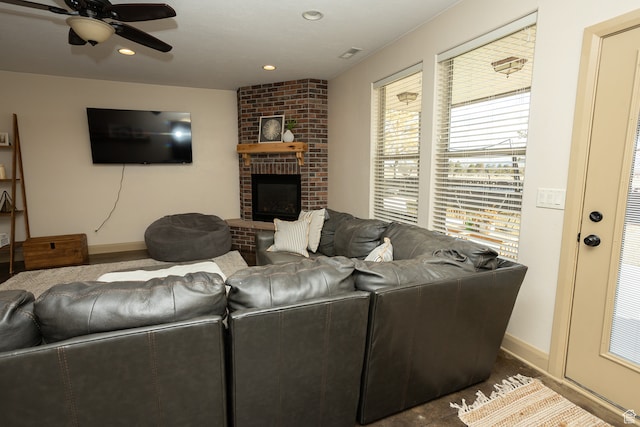 2195 S 1600 W, Richfield, UT 84701 - carpeted living room featuring a fireplace and ceiling fan