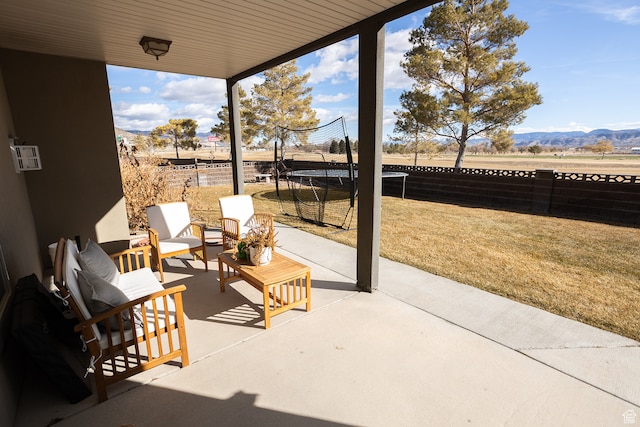 2195 S 1600 W, Richfield, UT 84701 - view of patio / terrace featuring a mountain view and a trampoline