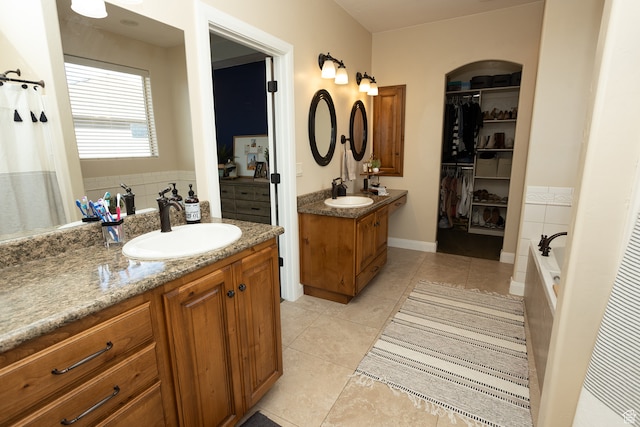 2195 S 1600 W, Richfield, UT 84701 - bathroom featuring vanity, tile patterned floors, and a bathtub