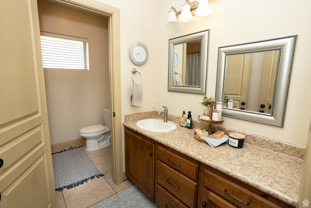 2195 S 1600 W, Richfield, UT 84701 - bathroom with tile patterned floors, vanity, and toilet